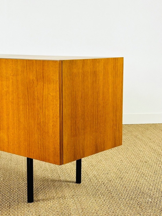 Image 1 of Minimalist Scandinavian sideboard in teak with black metal legs, 1960