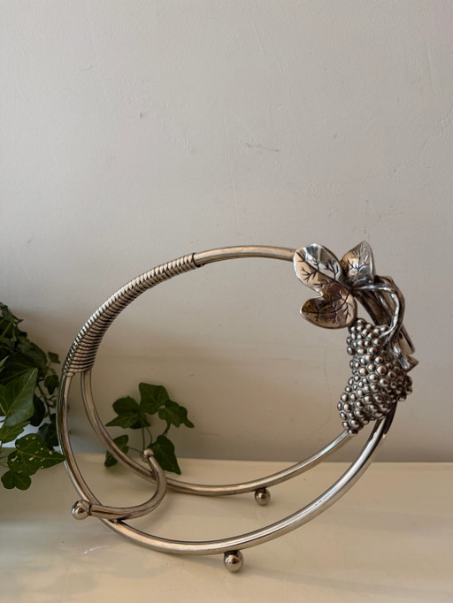 Portabottiglie vintage con grappolo d'uva