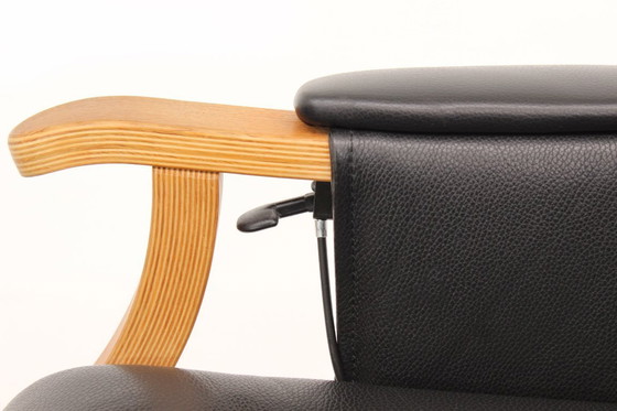 Image 1 of as new, Danish Nordic Easy Lounge Chair / Relax Armchair with stool in oak and leather.