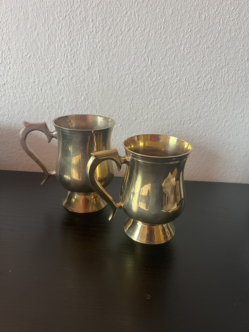 antique brass cups/tankards set