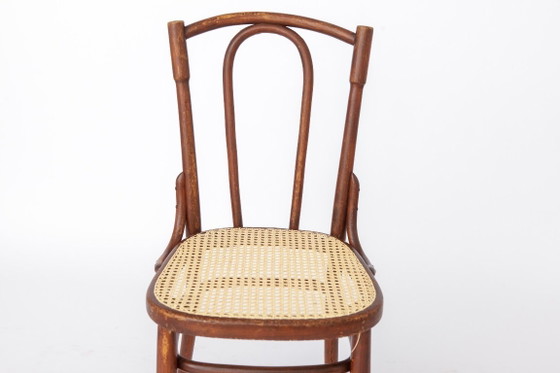 Antiker Bugholzstuhl im Stil von Thonet Nr. 56 | Österreichischer Rattanstuhl | 1930er Jahre (photo 2 of 13)