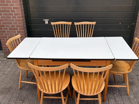 Image 1 of Vintage Pastoe Nesto eethoek tafel + 6 spijlen stoelen