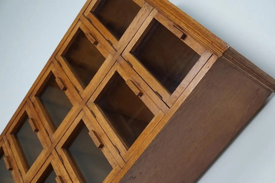 Image 1 of Vintage Dutch oak haberdashery cabinet / display cabinet with hinged doors, 1930s
