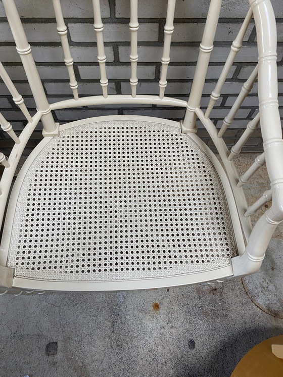 Image 1 of 4 vintage faux bamboo Regency Baker stoelen webbing