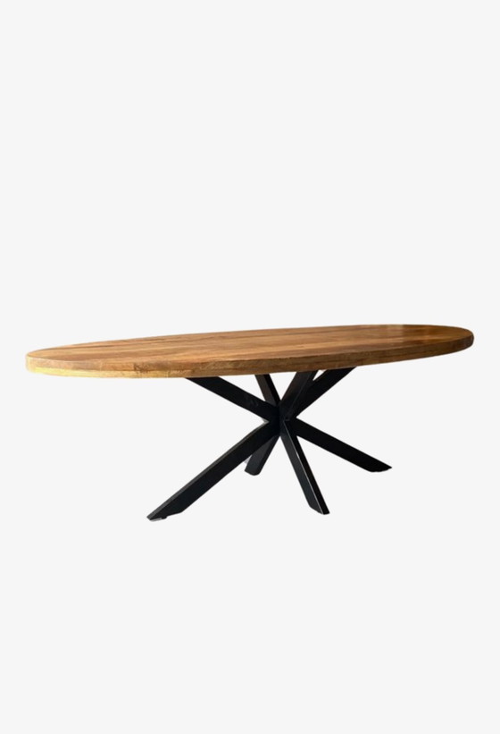 Image 1 of Ovaler Tisch mit Spinnenbeinen – 180 cm – Mangoholz