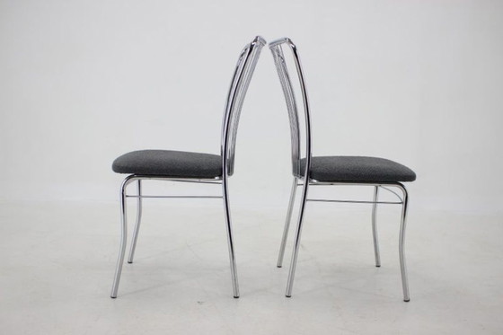 Image 1 of Set van zes Italiaanse eetkamerstoelen van chroom en bouclé, jaren 70.