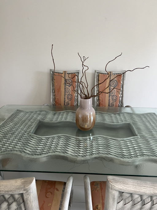 Mesa de cristal con 6 sillas de bambú/ratán (estudio de mimbre Schütz)