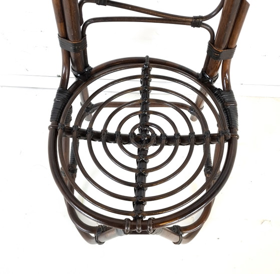 Image 1 of Chaise vintage en bambou/roseau marron foncé Rohe Noordwolde