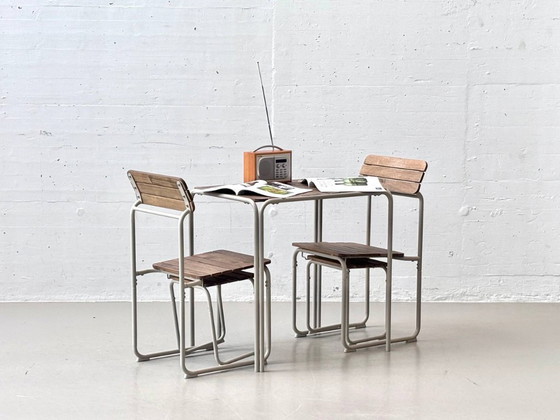 Image 1 of IKEA FURUÖN tuinset met tafel, 2 stoelen en 2 krukjes, gemaakt van acaciahout.