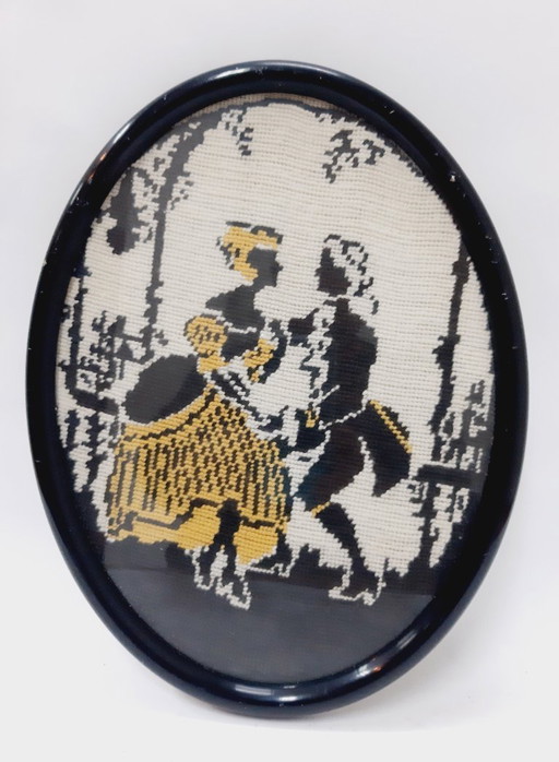 Bordado vintage enmarcado con aguja, pareja bailando