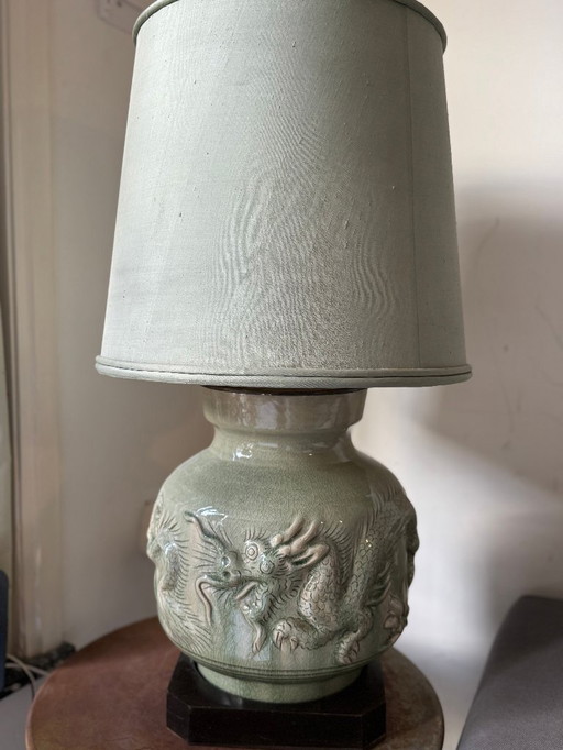 Beautiful celadon table lamp with dragon motif on ebony base