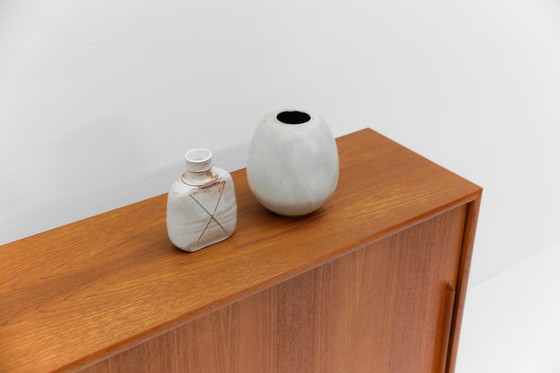 Image 1 of There is a small cosmetic flaw on the surface at the front left corner, see pictures