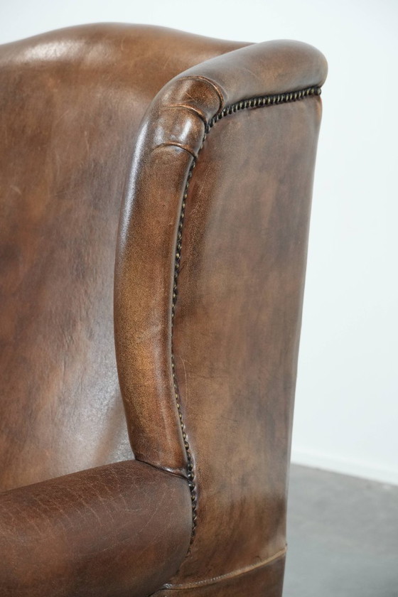 Image 1 of Comfortable vintage sheepskin wing chair with character