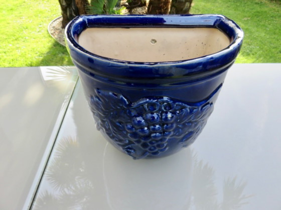 Image 1 of Wall-mounted flower pot, grape motif, in blue glazed ceramic, 1970s