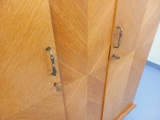 Image 1 of Vintage eikenhouten kledingkast uit de jaren 60