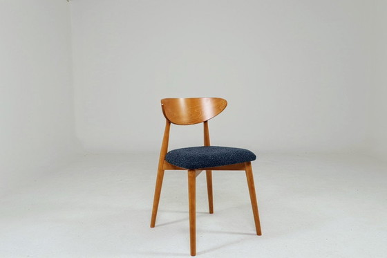 Image 1 of Scandinavische eetkamerstoelen set van 4, marineblauw met krullend design