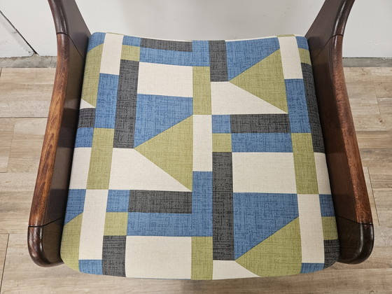 Image 1 of 70s eetkamerstoelen in beukenhout en stoffen uit het ruimte-tijdperk