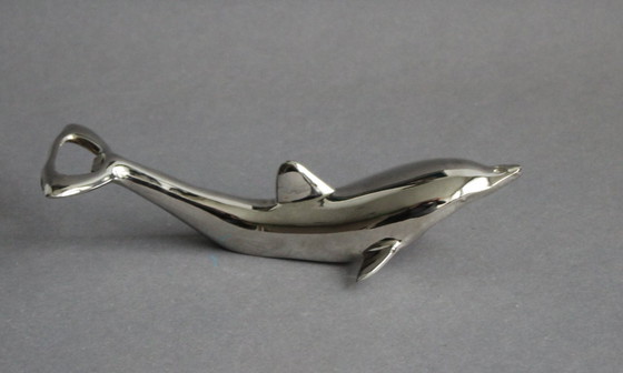 Image 1 of Décapsuleur vintage dauphin en métal argenté