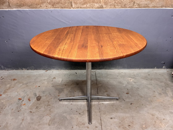 Image 1 of Round oak dining table with chrome base, vintage