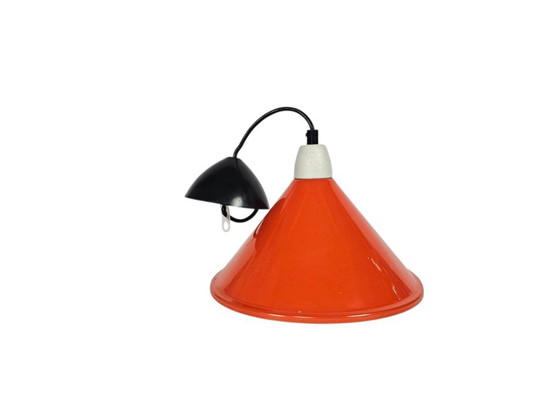 Image 1 of Suspension en métal au design industriel | orange | douille en porcelaine | années 80