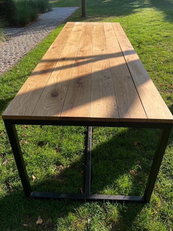Image 1 of Oak dining table/garden table