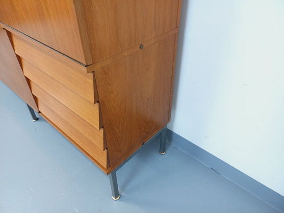 Image 1 of Louis Paolozzi's vintage modernist secretary bookcase for Monopoly in teak and metal from the 60s