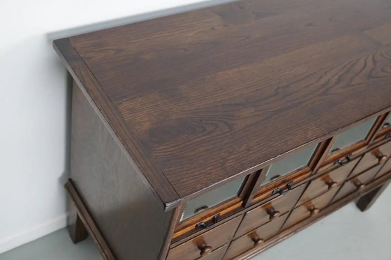 Image 1 of Antiguo armario de mercería alemán de roble, años 20/30