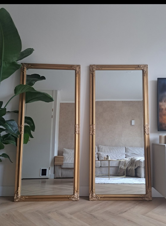 Image 1 of 2 grote antieklook spiegels met goudbronze lijst