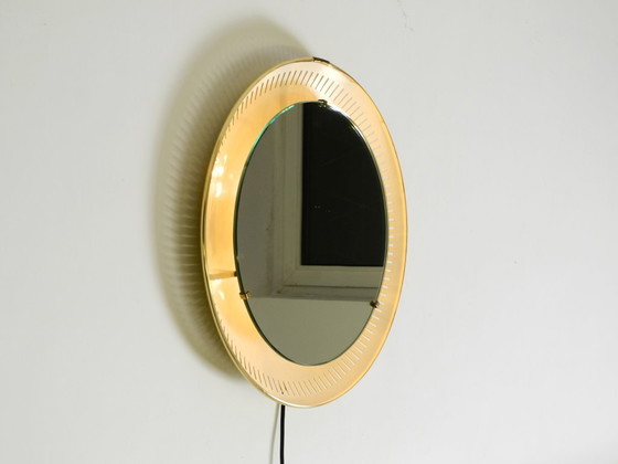 Image 1 of Rare miroir rond illuminé en métal Hillebrand, datant du milieu du XXe siècle (1966).