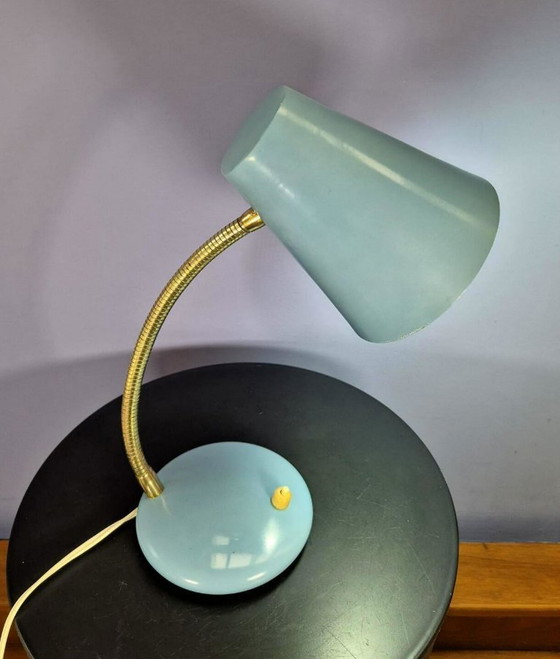 Image 1 of Massive desk lamp in light blue pastel.