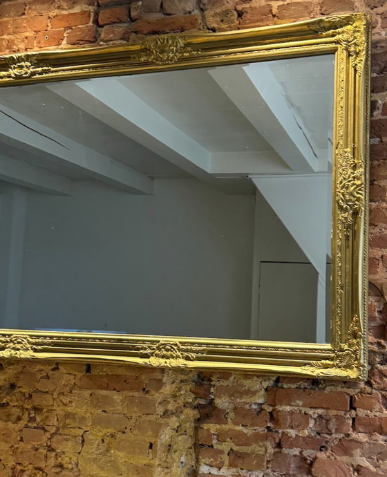 Image 1 of Large gold mirror with a baroque wood frame 