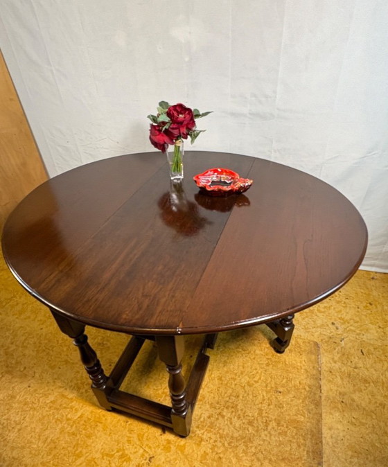 Image 1 of Jacobean Revival massief eiken klaptafel met neerklapbaar blad (circa 1900)