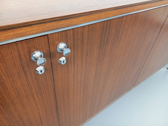 Image 1 of Vintage modern dressoir van palissanderhout en verchroomd metaal uit de jaren 60 en 70.