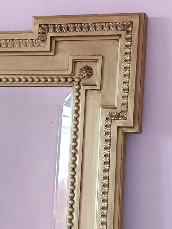 Image 1 of Large antique mirror in gilded wood and beveled glass