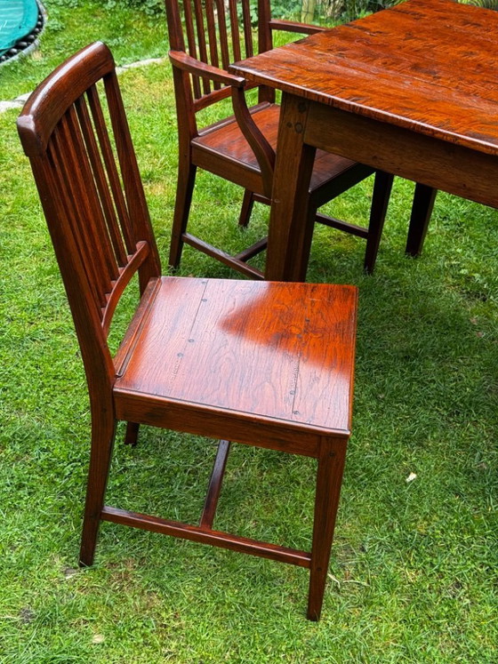 Image 1 of Grande table de salle à manger coloniale en teck massif avec 8 chaises et coussins