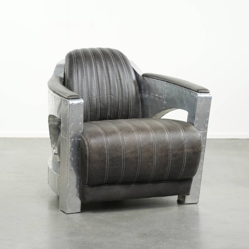 Fauteuil/robinet de style aviateur unique et confortable en cuir de vachette, finitions aluminium et rivets