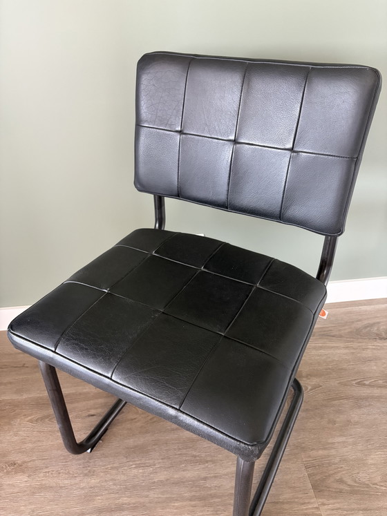 Image 1 of Fauteuil design Jess Nelson en cuir noir