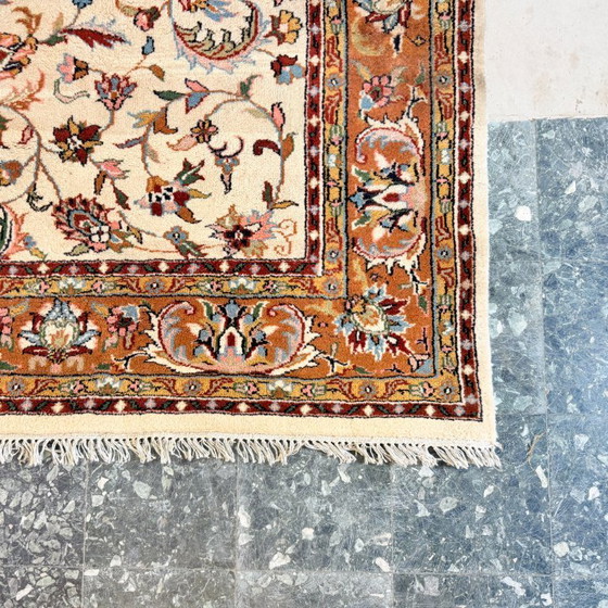 Image 1 of Large vintage rug with floral pattern