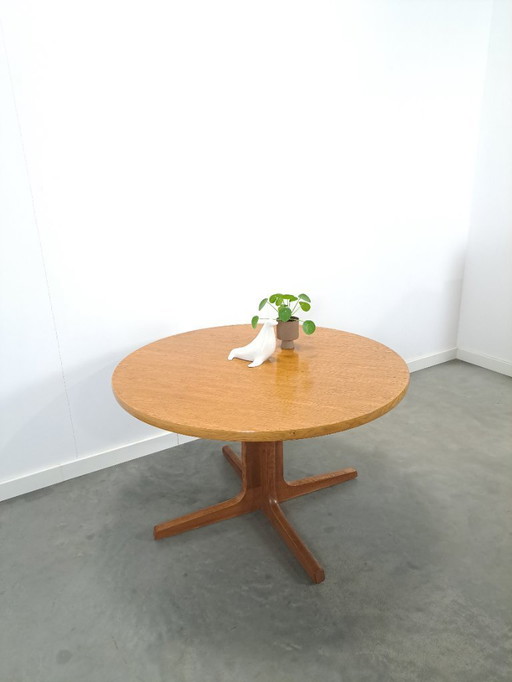 Round oval oak extendable dining table