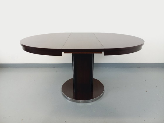 Image 1 of Table ronde de repas vintage en bois d’ébène et métal chromé style Space Age / Diner des années 70 avec rallonge intégrée