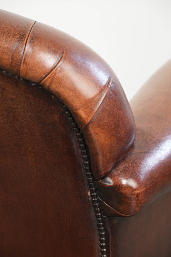 Vintage schapenleren armchair met een comfortabele zit en afgewerkt met siernagels – Fauteuils, Leather (photo 13 of 14)