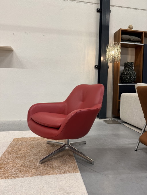 Sillón giratorio Leolux Pode Sparkle de piel roja
