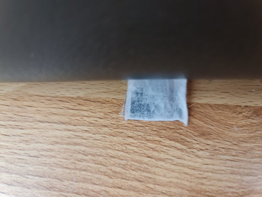Poef hocker voetenbank Leolux zwart leer Bora