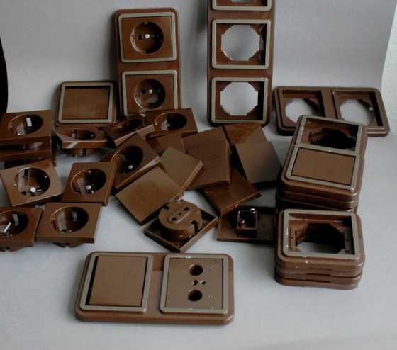 Image 1 of Large collection of vintage brown light and socket switches from the 1970s, brand BLASS.