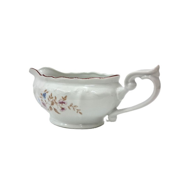 Image 1 of Saucière élégante en porcelaine à décor floral