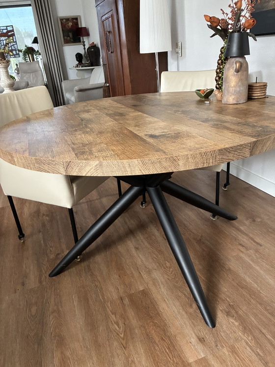 Image 1 of Round dining table with spider leg