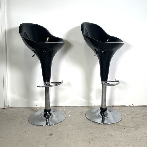 Set van twee kunststof retro barkrukken 