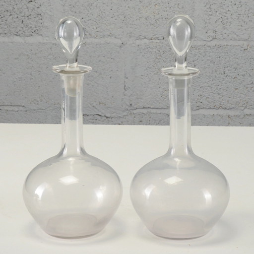 Par de botellas de mesa de cristal antiguas de principios del siglo XX