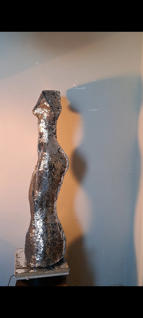 Image 1 of Torse argenté