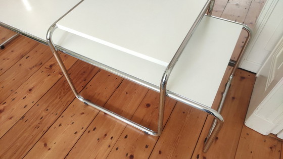 Image 1 of 2 tables design en tubes chromés